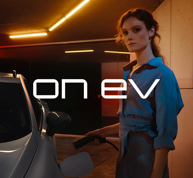 Woman charging CUPRA Car
