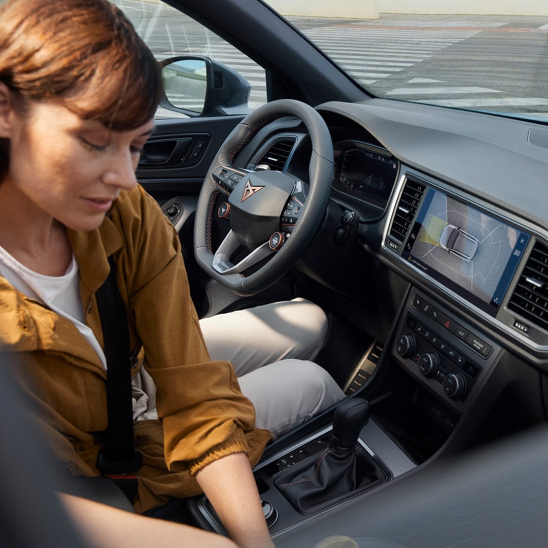 Woman%20sitting%20in%20front%20seat%20of%20CUPRA%20car