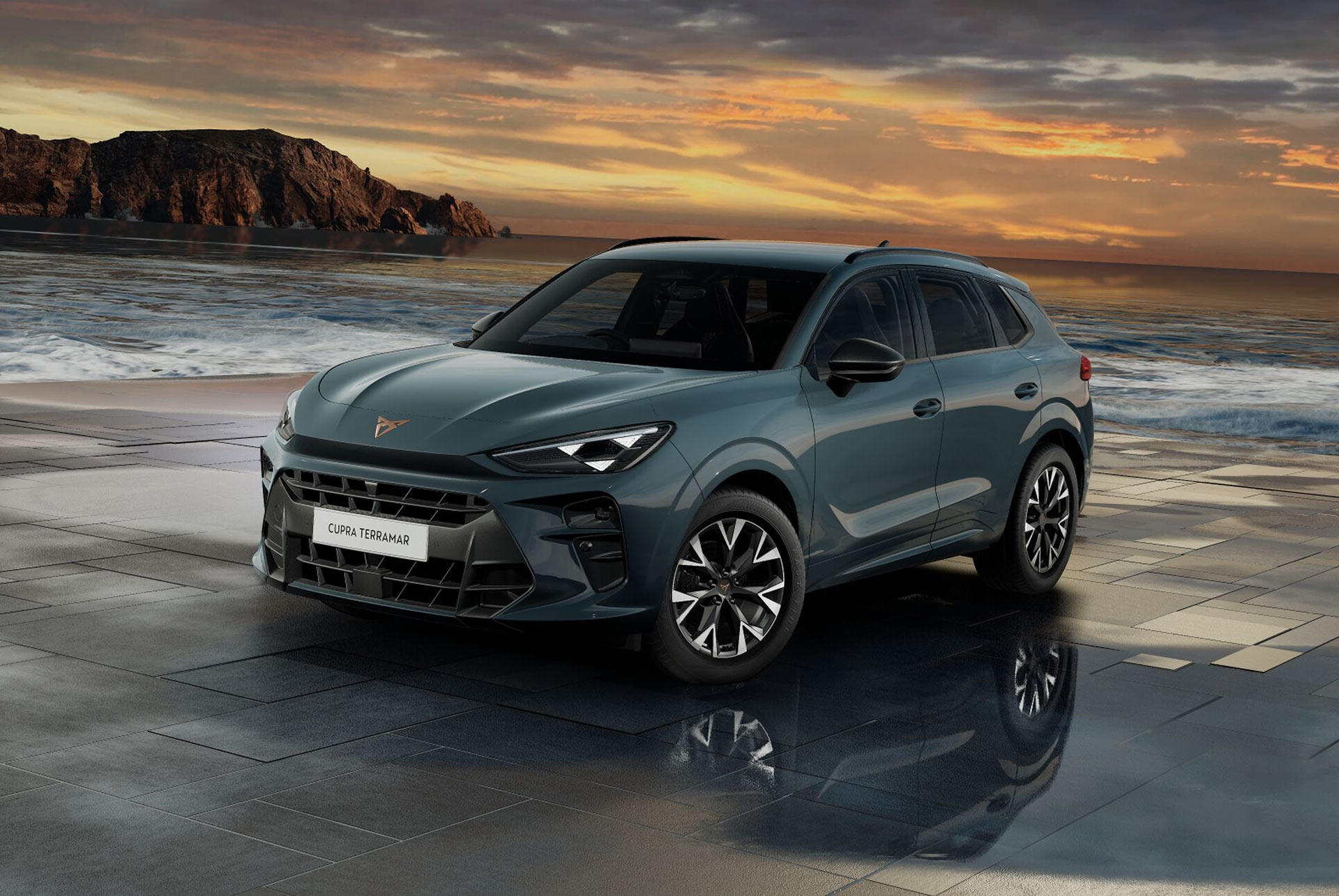 cupra terramar hybrid suv, new 2024 model, side view, featuring 20-inch america’s cup alloy wheels and akebono brakes, enceladus grey matt, on a wet pavement by the sea at sunset. 