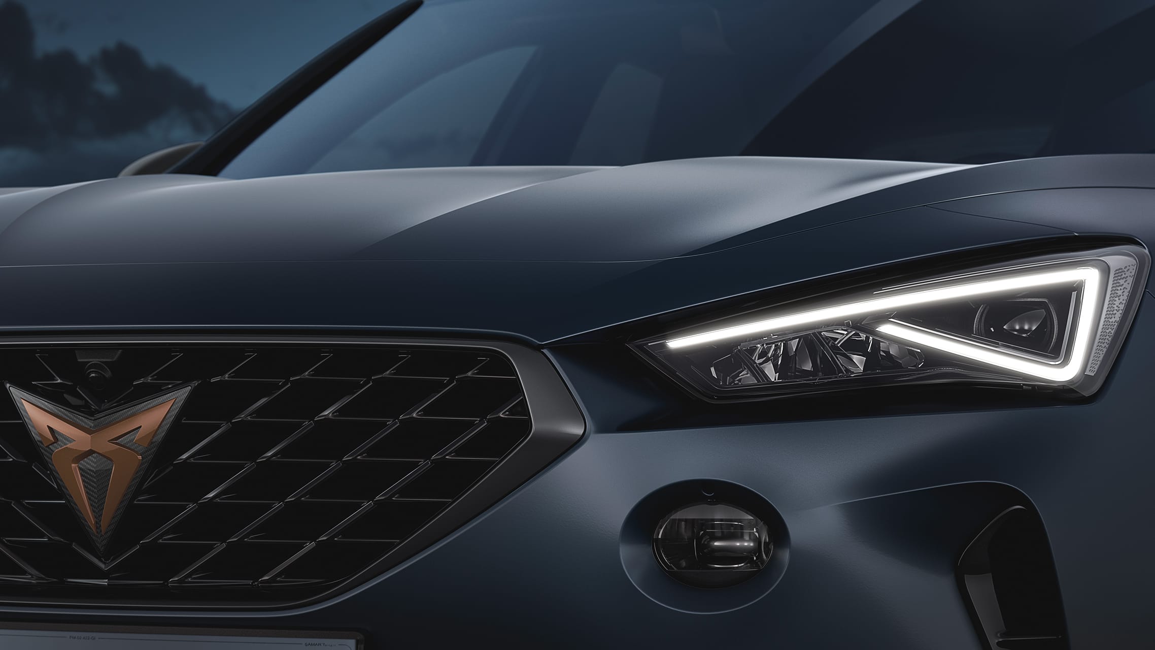  new CUPRA Formentor e-hybrid dark camouflage colour on the road 